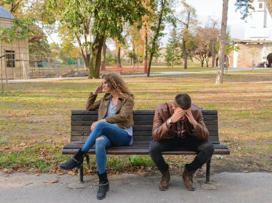 couple bickering on a bench
